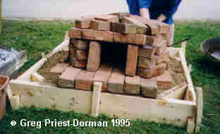bricks stacked into oven shape